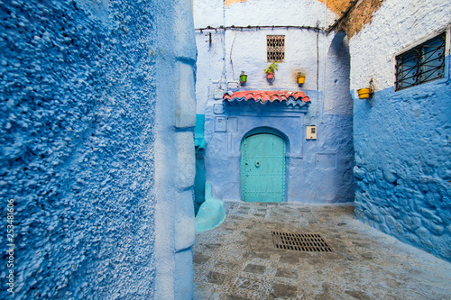 Street with blue walls in Chefchaouen in Morocco © Marko Rupena