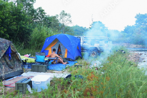 Hiking groups travel among natural scenery. Resting on a tent resting on a stream in the jungle of Thailand on March 20  2018