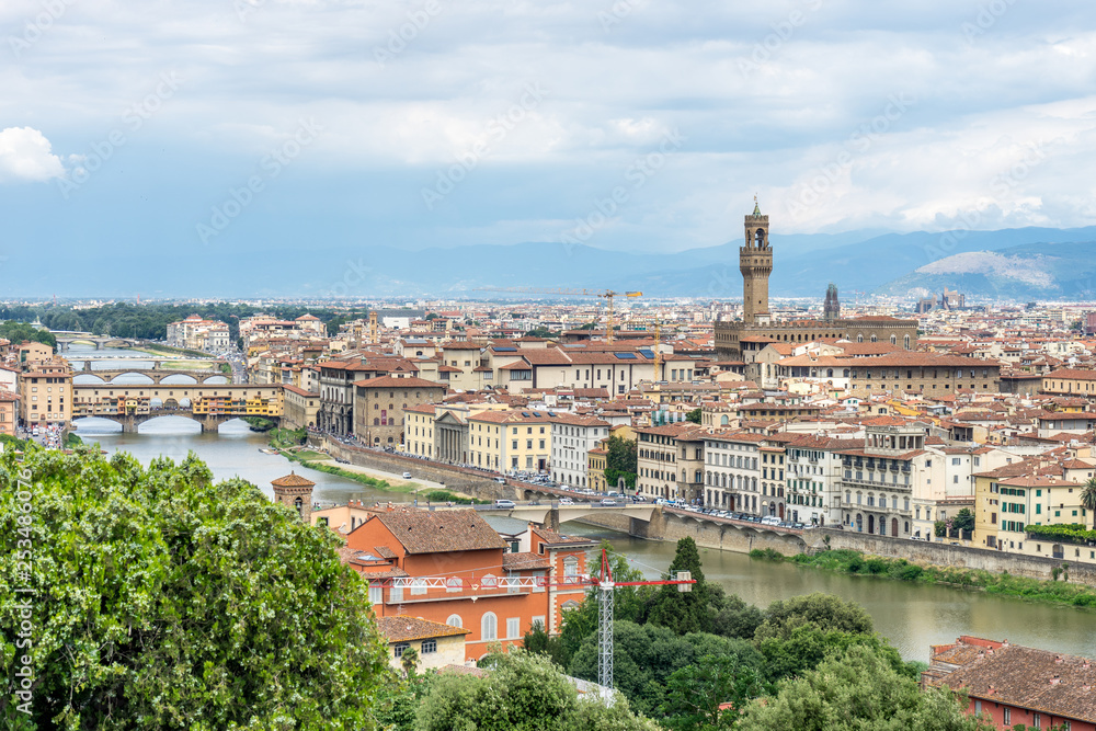 Panaromic view of Florence townscape cityscape viewed from Piazzale Michelangelo (Michelangelo Square) with ponte Vecchio and Palazzo Vecchio