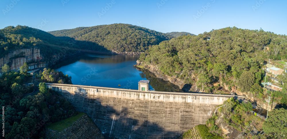Aerial panorama of Nepean Dam wall and lake Nepean at sunrise. Bargo, New South Wales, Australia