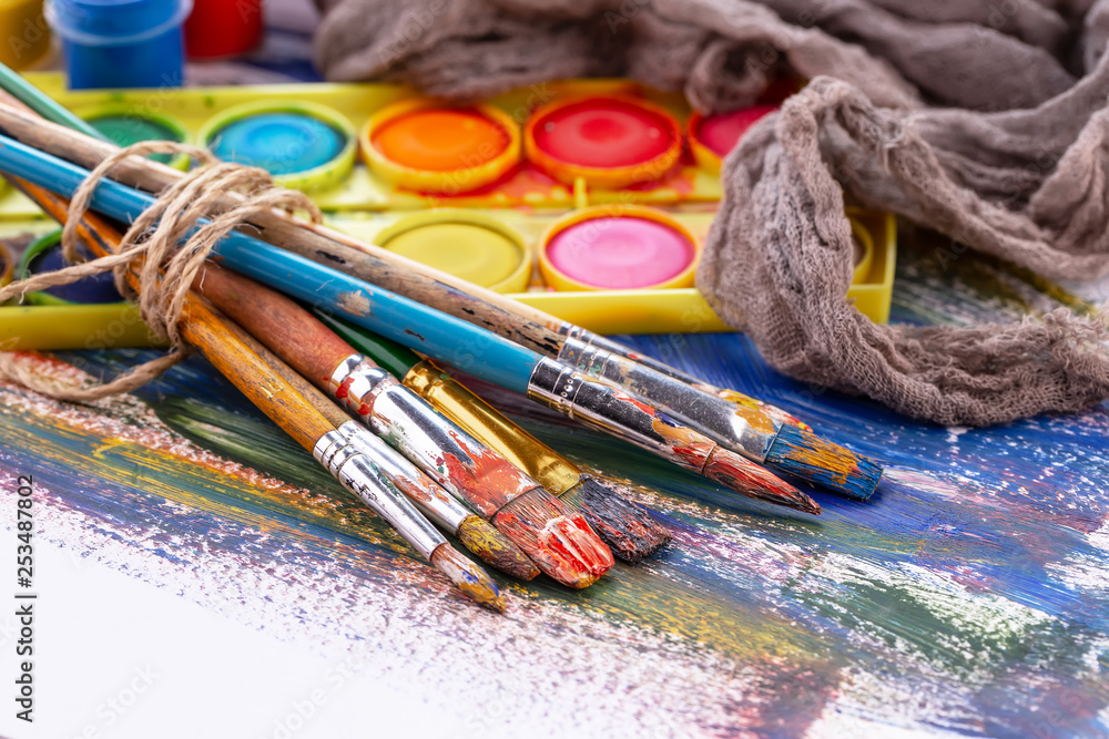 Paint brushes and paints for drawing. Paint brushes and paints for drawing.