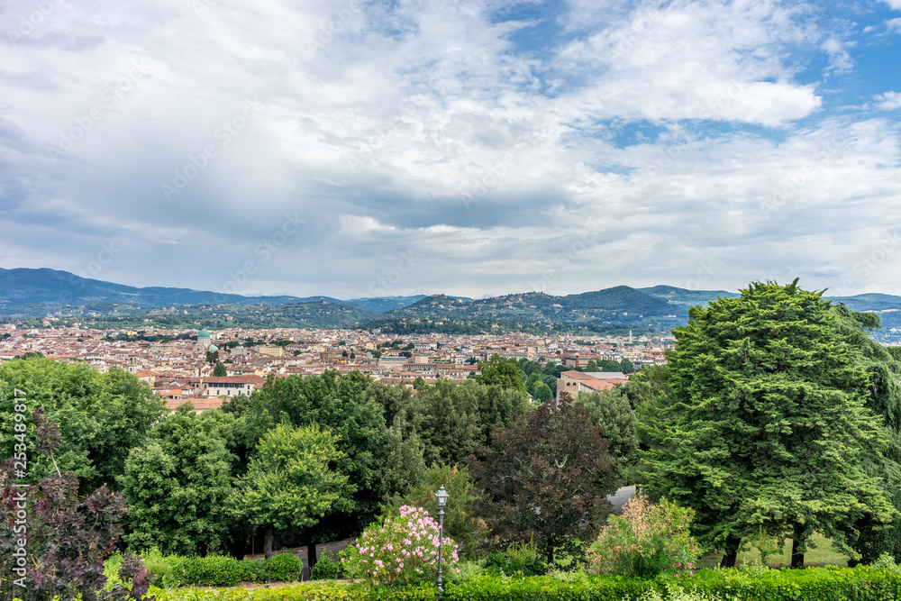 Obraz premium Italy,Florence, a large green field with trees in the background