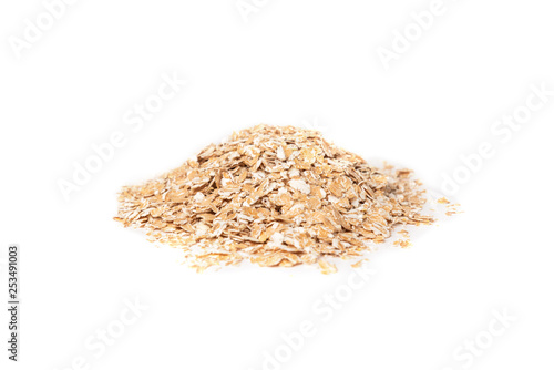 Wheat flakes isolated on white background.
