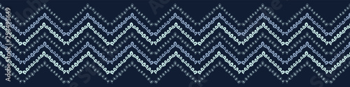 Indigo blue geometric chevron border pattern. Seamless repeating. Hand drawn vector illustration. Ornamental arrow motif. Japansese kimono style textile. Trendy fashion asian fusion ribbon trim. photo
