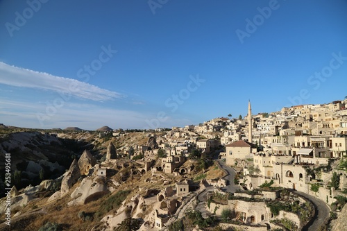 View of ancient Nevsehir cave town and a castle of Uchisar dug from a mountains in Cappadocia, Central Anatolia,Turkey