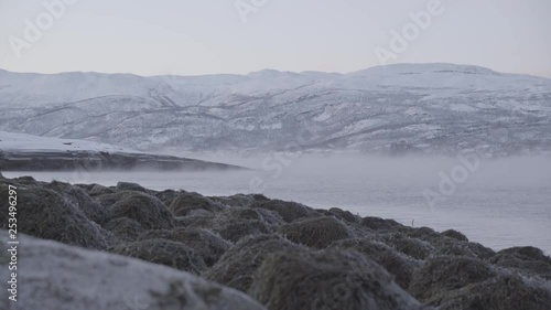 Wallpaper Mural Frozen lake with smoke hovering above it. Torontodigital.ca