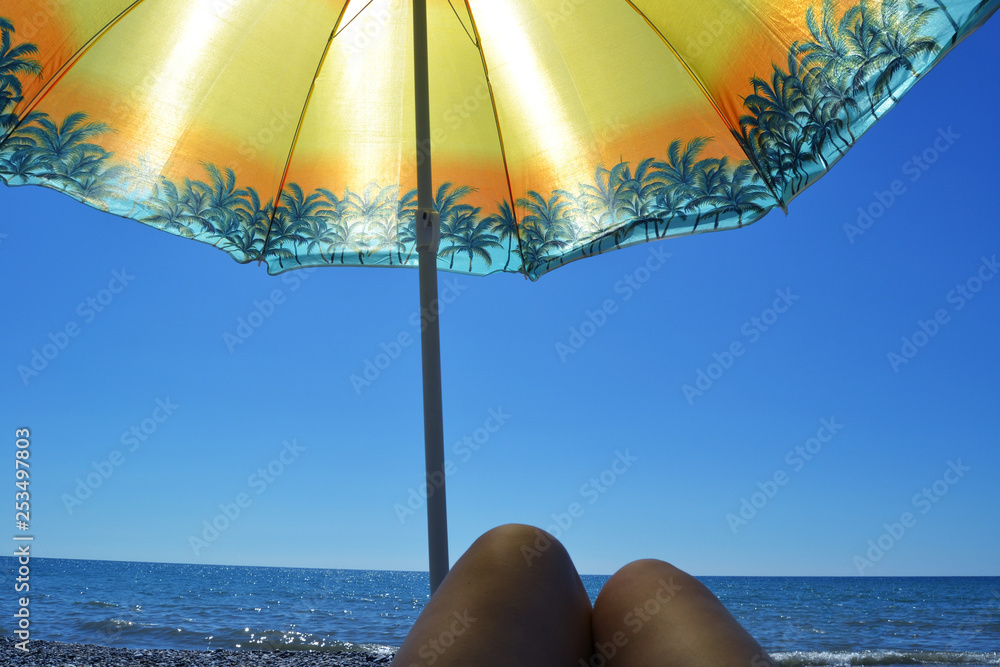 On the sea under an umbrella