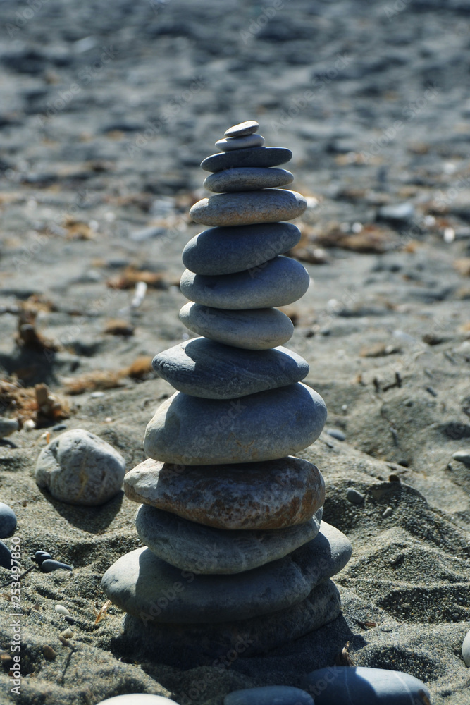 Tower of stones on the sand