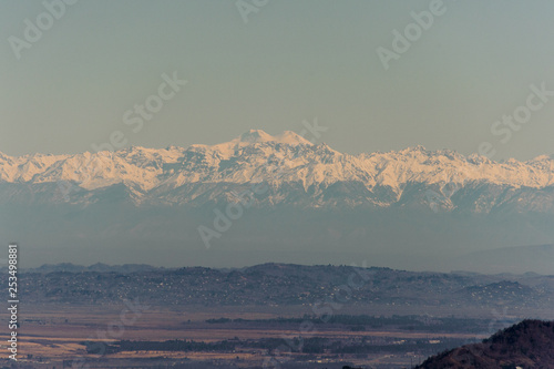 Breathtaking view on the snowy Caucasus mountains under the sky