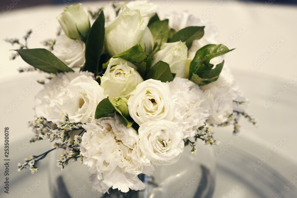 a vase of white roses and carnations a vase of white roses and carnations