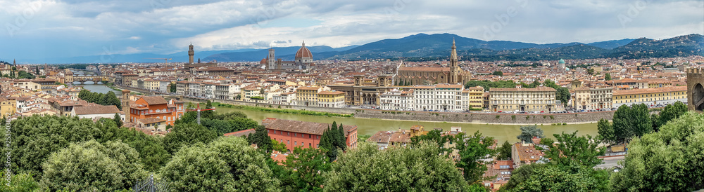 Panaromic view of Florence with Basilica Santa Croce and City gate of San Niccolo and Duomo and Ponte Vecchio viewed from Piazzale Michelangelo (Michelangelo Square)