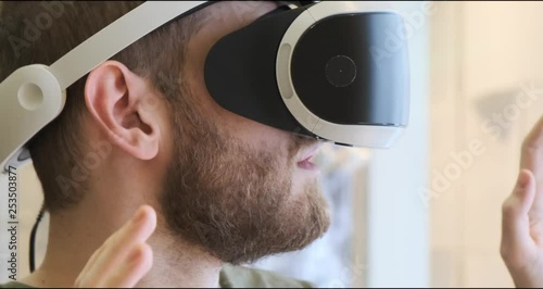 Man using virtual reality headset indoors 4k, close-up