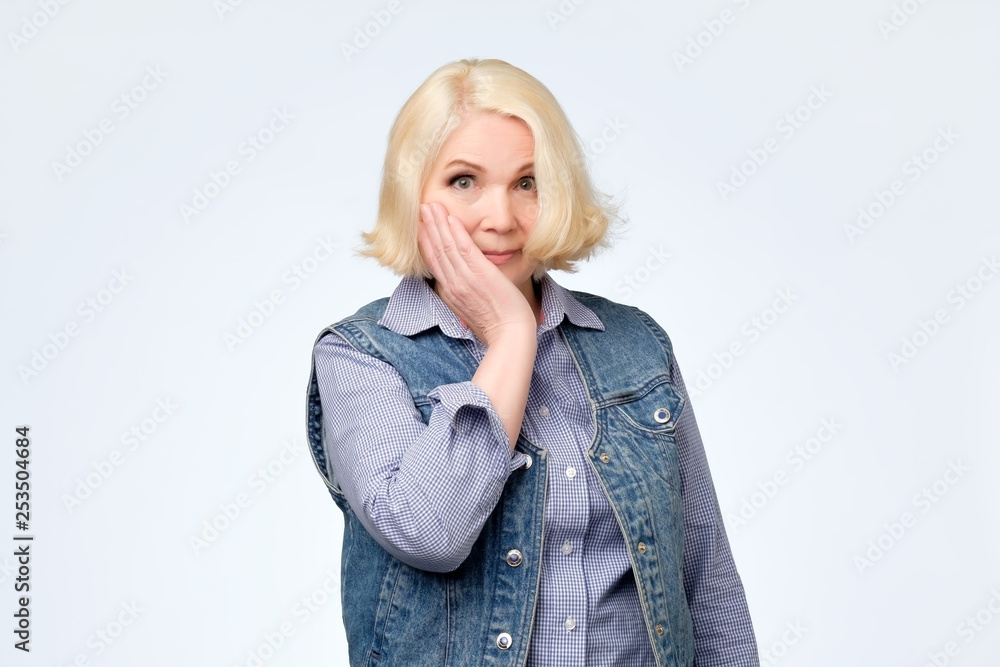 Senior pretty woman is thinking abput her life problems. Senior pretty woman is thinking abput her life problems.