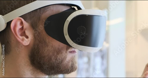 Man using virtual reality headset indoors 4k, close-up