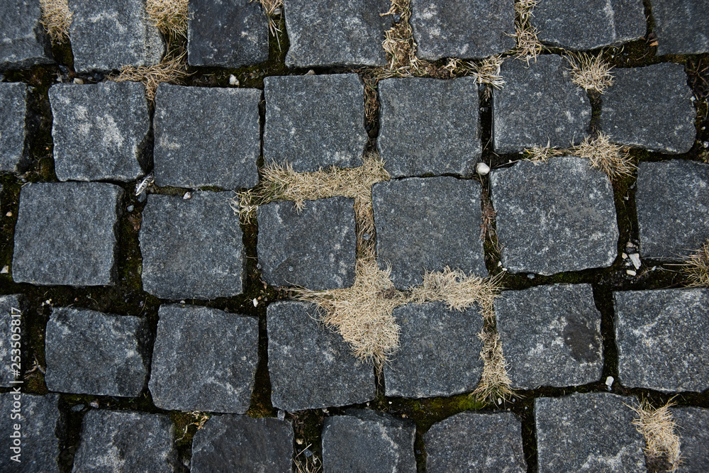 Round cubic stone road close up