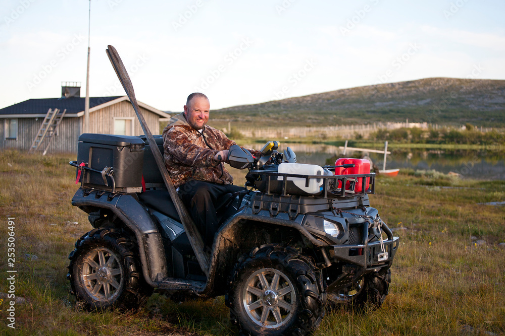 Fototapeta premium Fisherman in the car