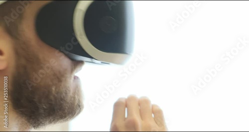 Man using virtual reality headset indoors 4k, close-up