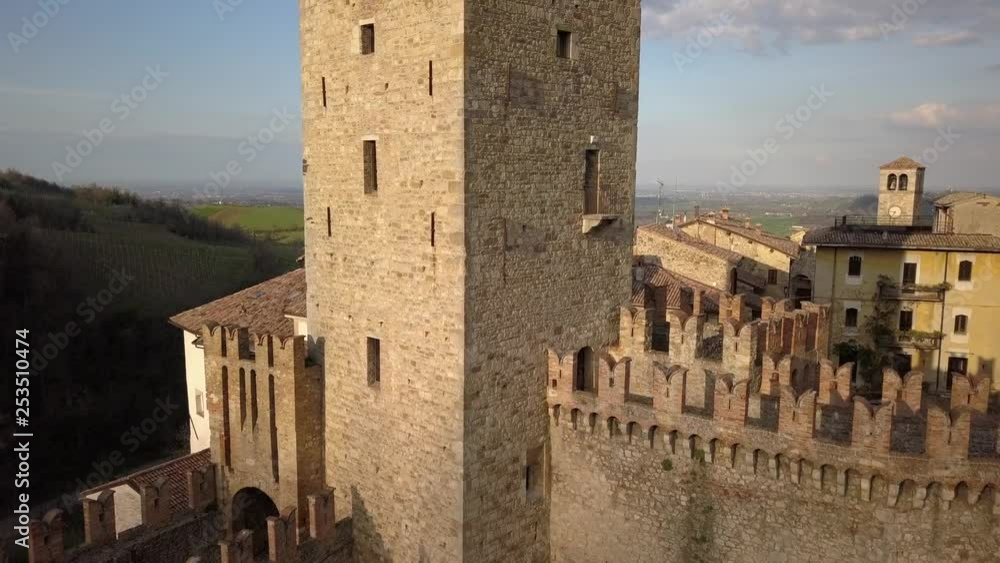 Drone aerial video of the entire ancien small village with the tower of Vigoleno in the country of Piacenza province, Emilia Romagna, Italy.