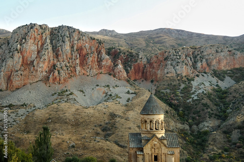 The Christian Apostolic Church Noravank in Armenia on the background of the Caucasus mountains