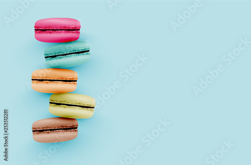 High detailed colourful macarons on blue background, vector illustration