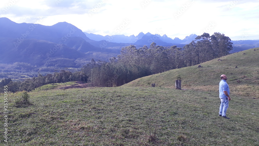 woman walking in the mountains woman walking in the mountains