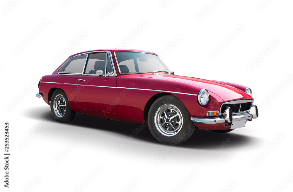 Red British sport classic car isolated on white