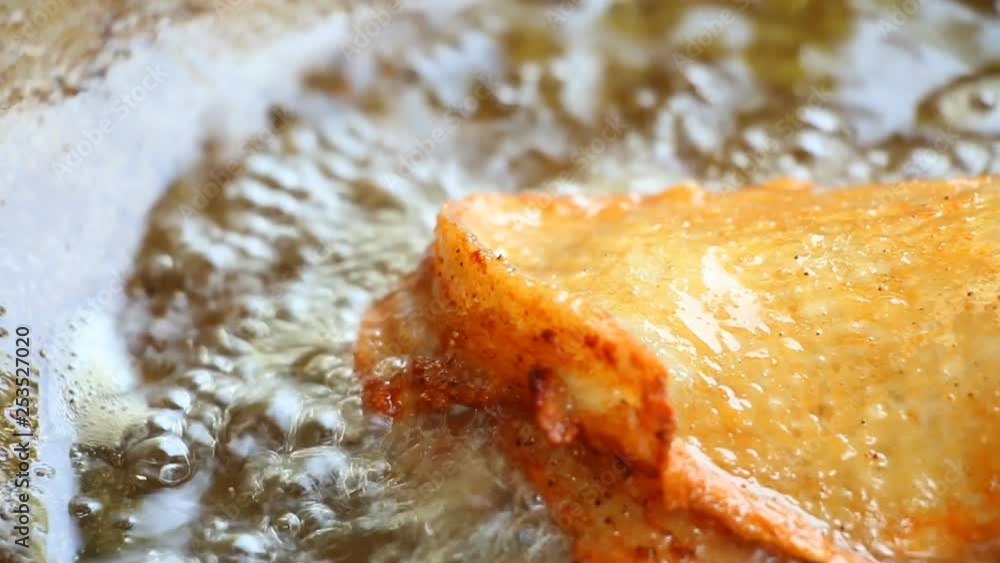 Frying chicken in pan, in street market Chiangmai Thailand Frying chicken in pan, in street market Chiangmai Thailand