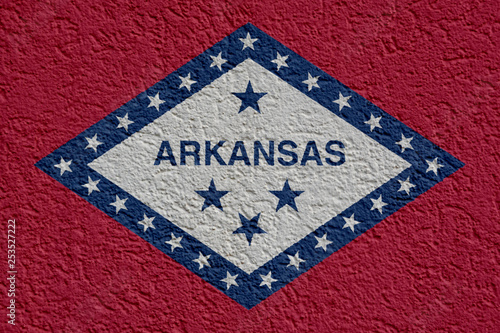 US State Politics Or Business Concept: Arkansas Flag Wall With Plaster, Background Texture