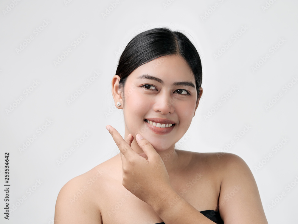 Beautiful Young asian Woman with Clean Fresh Skin look. Girl beauty face care. Facial treatment. Cosmetology, beauty and spa Beautiful Young asian Woman with Clean Fresh Skin look. Girl beauty face care. Facial treatment. Cosmetology, beauty and spa