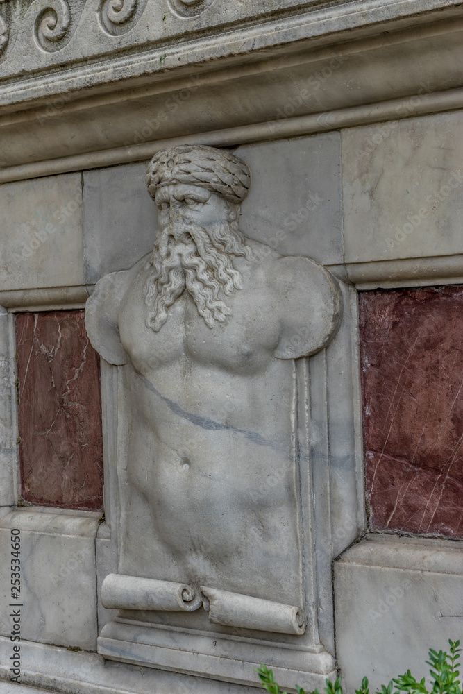 Italy,Florence, a statue in front of a brick building