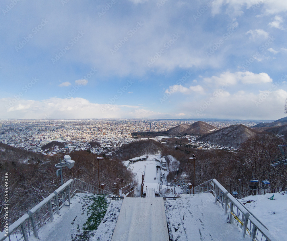 Ski jump stadium are covered with snow from top view in winter. Ski jump stadium are covered with snow from top view in winter.