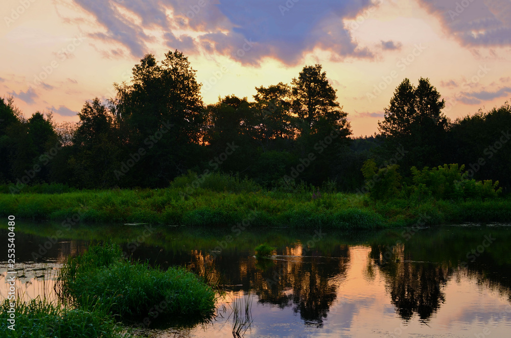Beautiful summer landscape with sunrise in the morning on the river Beautiful summer landscape with sunrise in the morning on the river