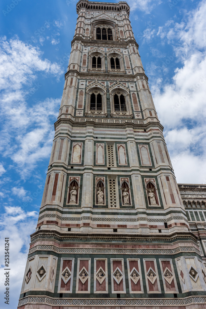 Italy,Florence, Giotto's Campanile, a large tall tower with a clock at the top of Giotto's Campanile