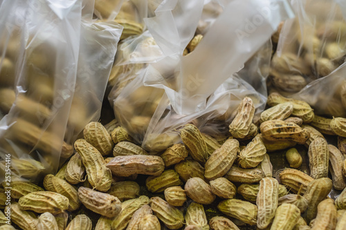 Boiled peanuts with plastic bag at the market in Thailand photo