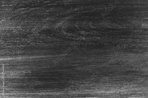 Abstract black wooden surface texture background.