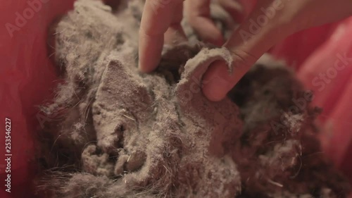 Touching dust with hand