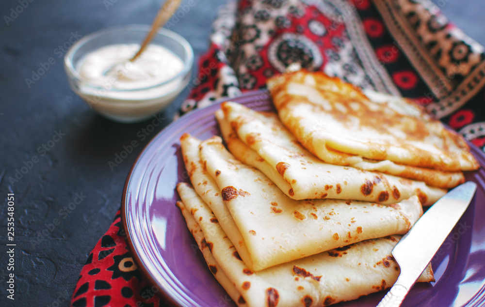Stack of homemade thin pancakes or crepes or pancake cake, selective focus. Stack of homemade thin pancakes or crepes or pancake cake, selective focus.