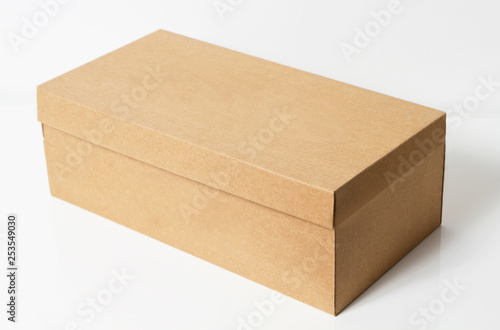 Brown craft paper box on white background top view. Object with clipping path, mock up © paulcannoby