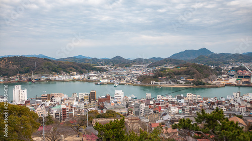 Panoramic, scenic view of Onomichi City and the Seto Inland Sea as seen while climbing the countless steps towards the summit of Mt. Senkoji in Hiroshima Prefecture in Japan. © MyPixelDiaries