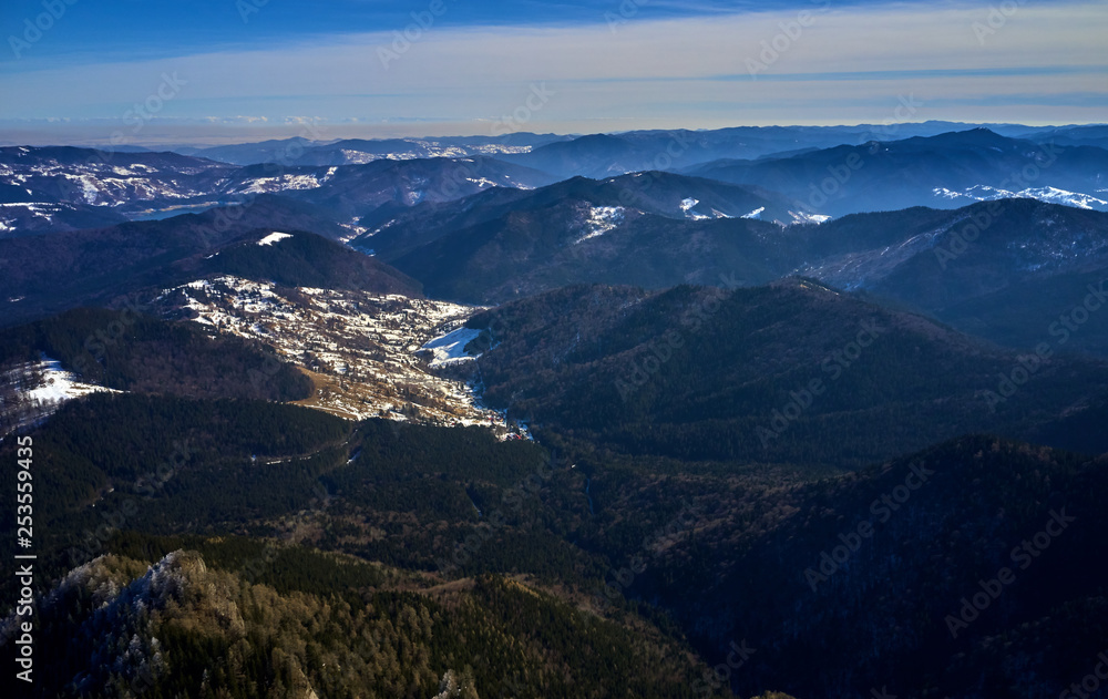 Aerial Landscape view from Ceahlău Mountains National Park at sunrise in winter season Aerial Landscape view from Ceahlău Mountains National Park at sunrise in winter season