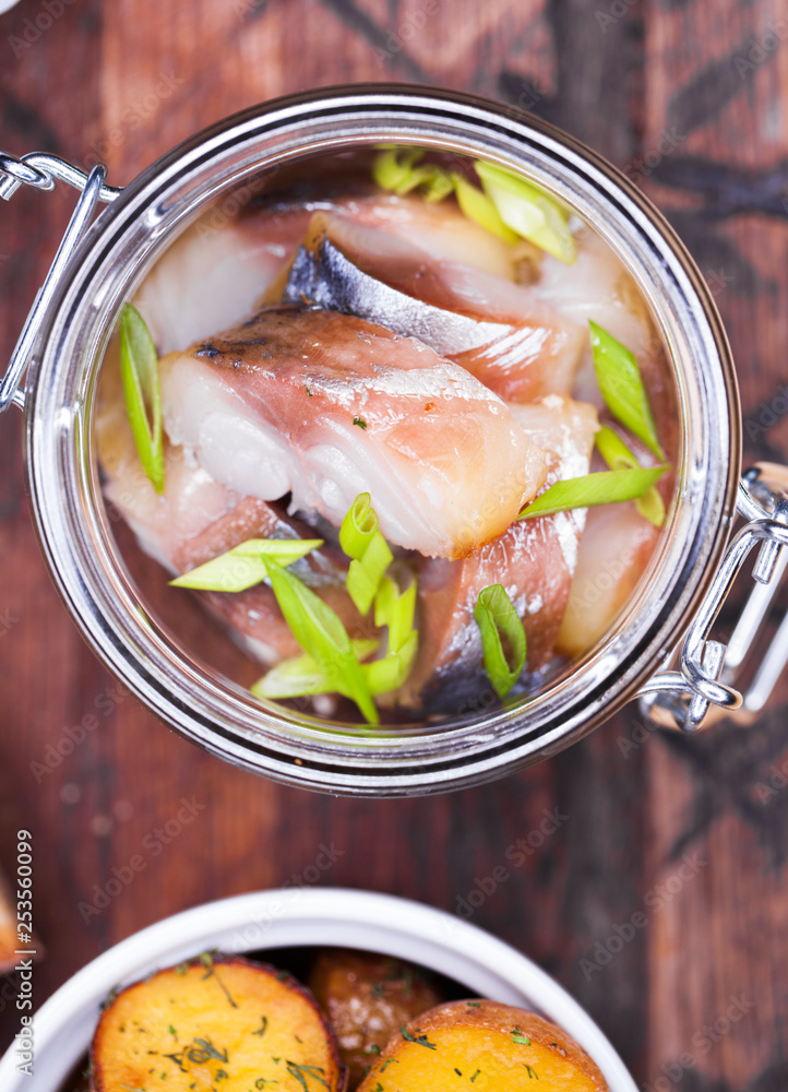 Marinated mackerel in a glass jar - snack under vodka Marinated mackerel in a glass jar - snack under vodka