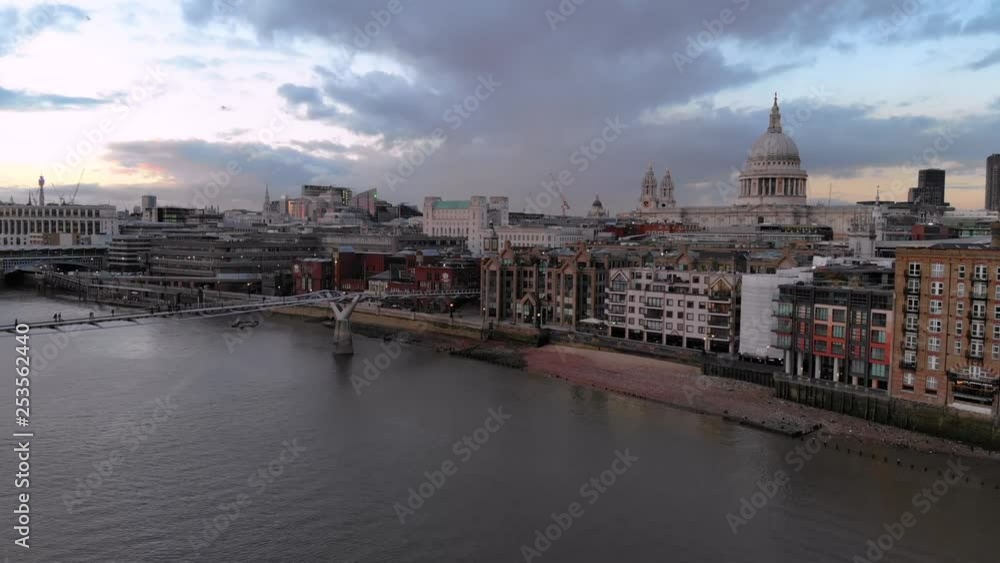 Aerial view of St Paul's Cathedral after sunset as the camera is raising up above the River Thames Aerial view of St Paul's Cathedral after sunset as the camera is raising up above the River Thames