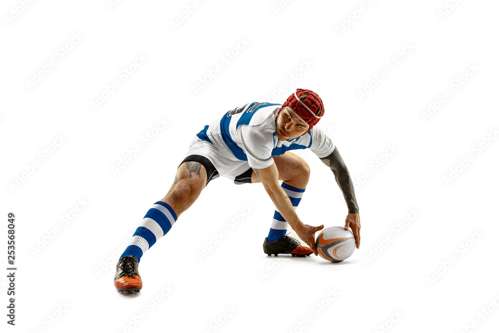 The silhouette of one caucasian rugby man player isolated on white background. Studio shot of fit man in motion or movement with ball. Jump and action concept. an incredible strain of all forces The silhouette of one caucasian rugby man player isolated on white background. Studio shot of fit man in motion or movement with ball. Jump and action concept. an incredible strain of all forces