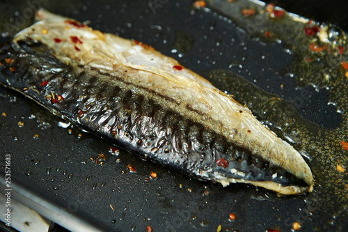 Grilling fish with spice  photo
