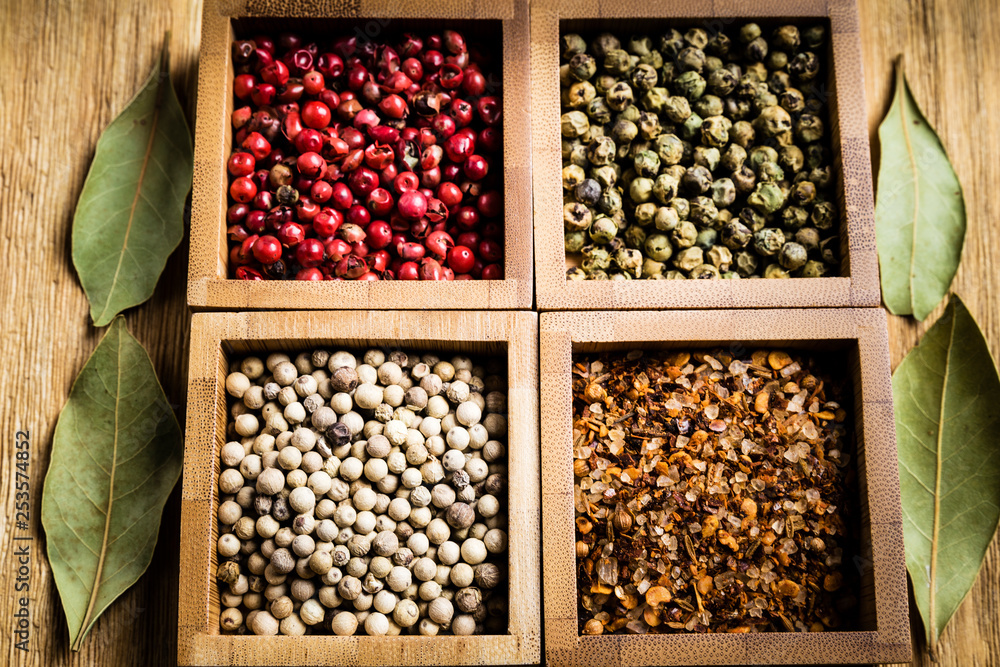 spices for a tasty meal on an old wooden table spices for a tasty meal on an old wooden table