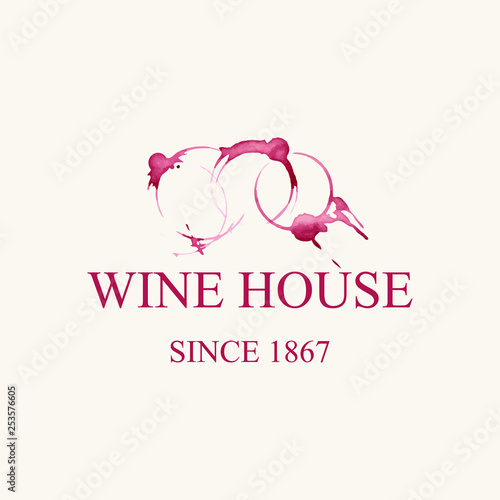 Watercolor logo for wine house in forme of grape vines make from wine stains isolated on light beige background. Vector illustration EPS10