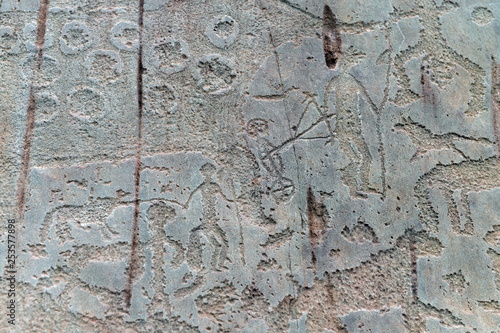    Rock petroglyphs in the tract Kalbak-Tash photo