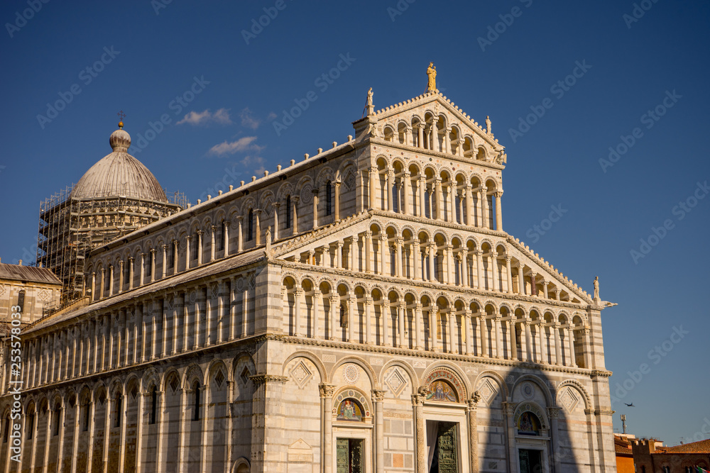 The leaning tower of pisa at Piazza del Miracoli Duomo square,Camposanto cemetery in Tuscany, Italy