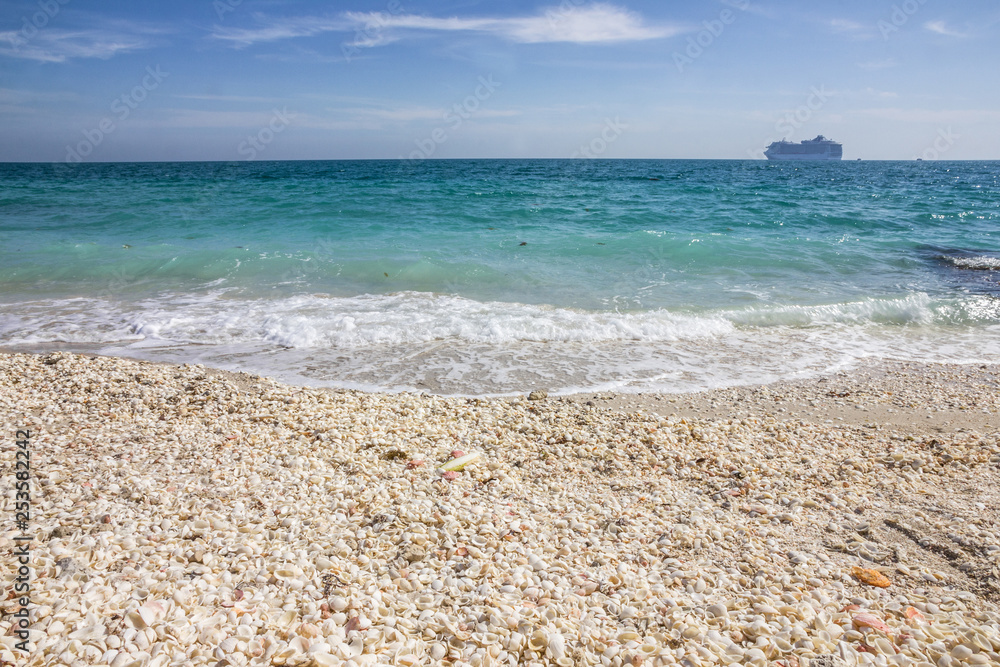 Sea pebble beach in Abu Dhabi, UAE. Sir Bani Yas island Sea pebble beach in Abu Dhabi, UAE. Sir Bani Yas island