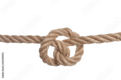 Cotton rope with knot on white background